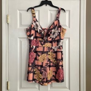 Amazon romper, side zipper, size extra large, tires in the front